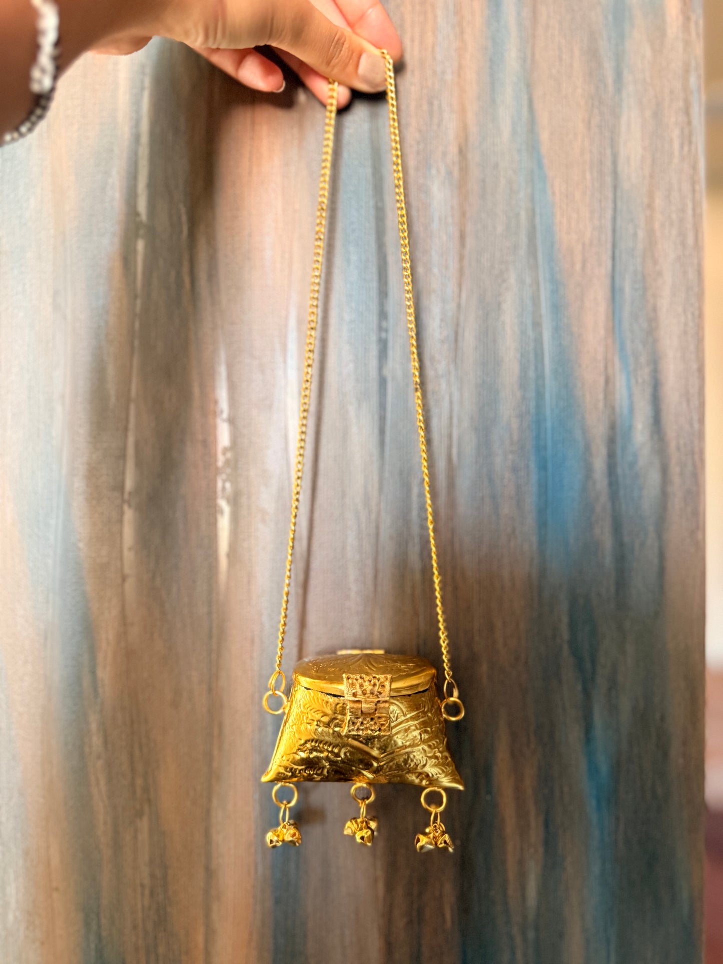 Mini brass bag