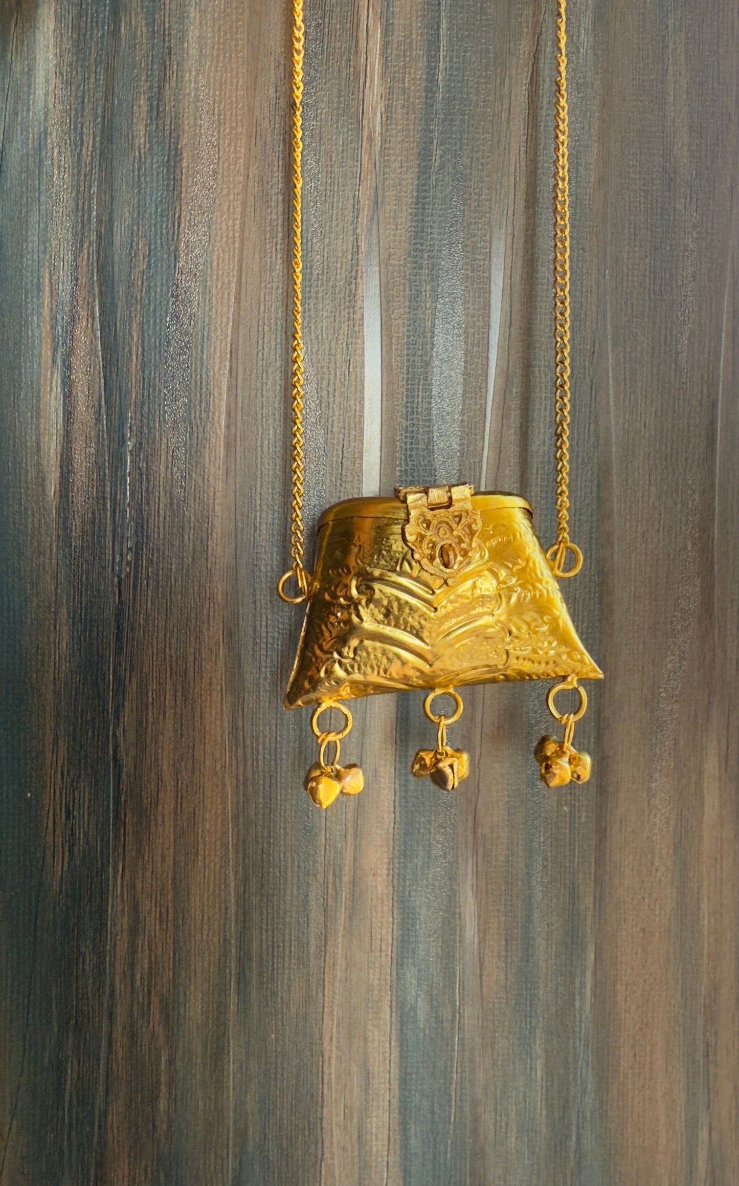 Mini brass bag