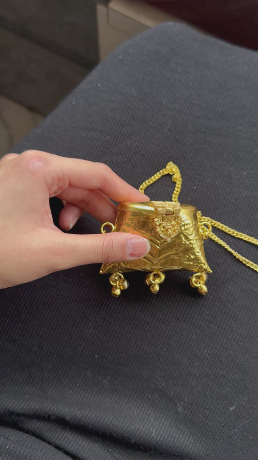 Mini brass bag